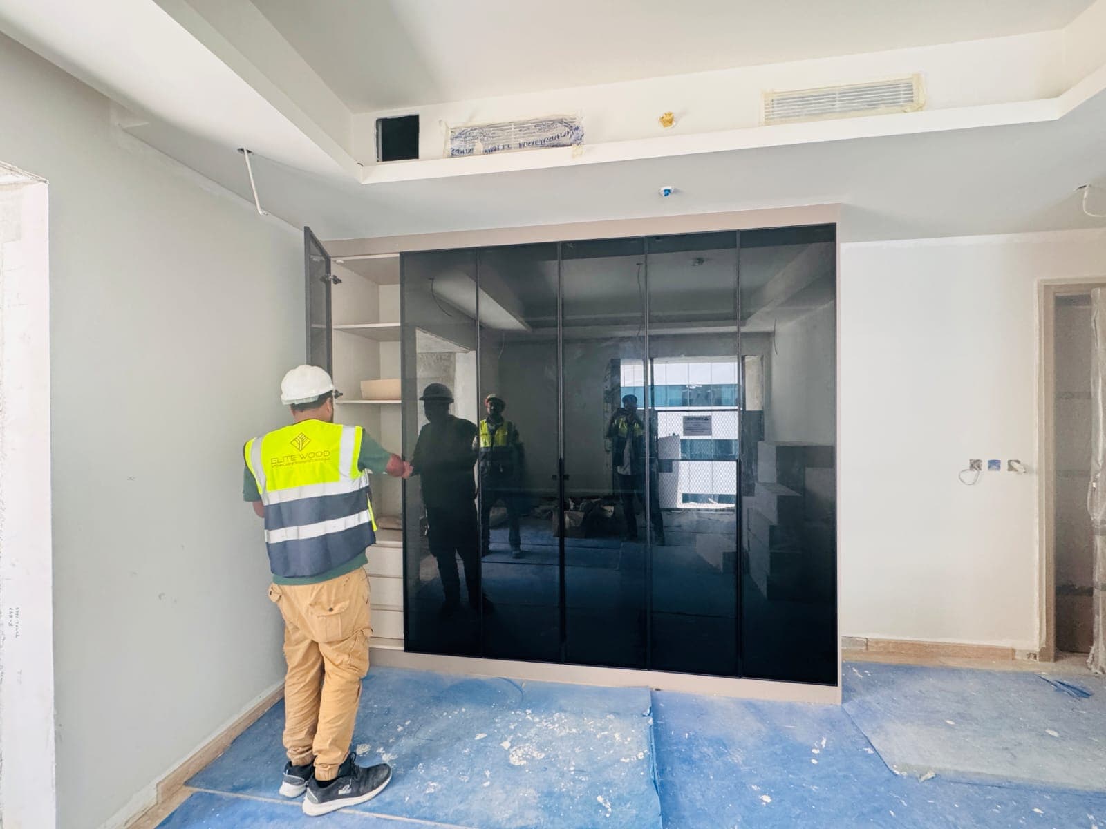 Sicilia installation team fitting a wardrobe