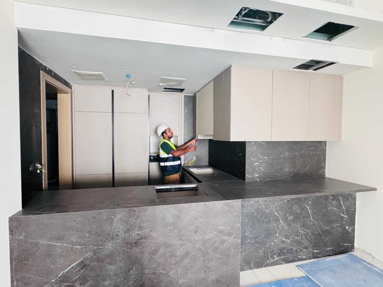Sicilia installation team fitting a kitchen